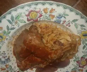 Kouneli Stifado- rabbit stewed with allspice-tomato sauce; housemade pasta
