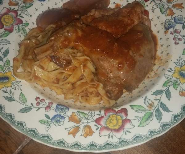 Kouneli Stifado- rabbit stewed with allspice-tomato sauce; housemade pasta